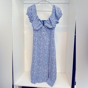 Urban Outfitters - Small
Kiss The Sky Floral Puff Sleeve Midi Dress